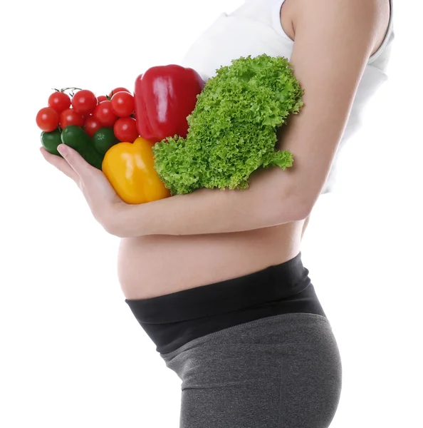 Pregnant woman holding fresh vegetables, isolated on white — Stock Photo, Image