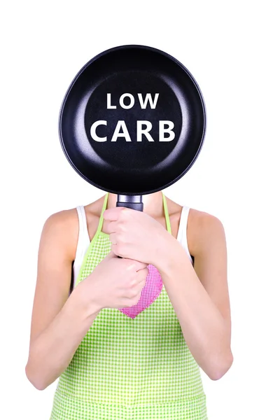 Woman holding pan with Low Carb text — Stock Photo, Image