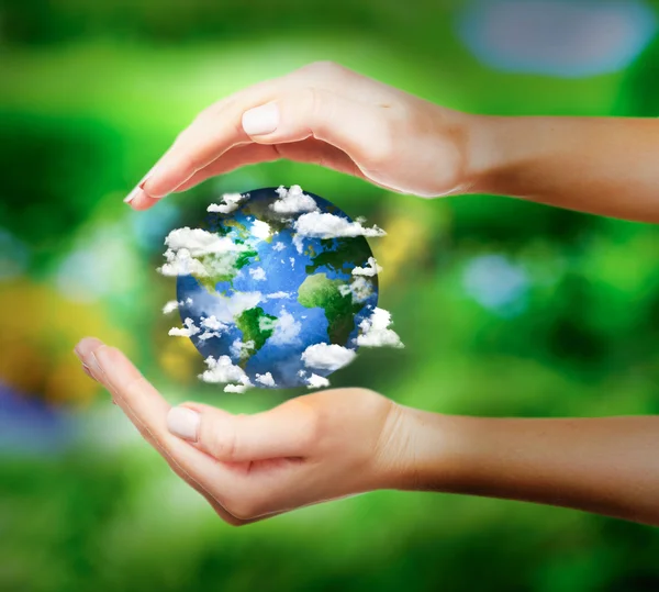 Woman holding globe Stock Image