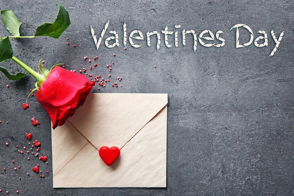 Envelope with small hearts and rose — Stock Photo, Image