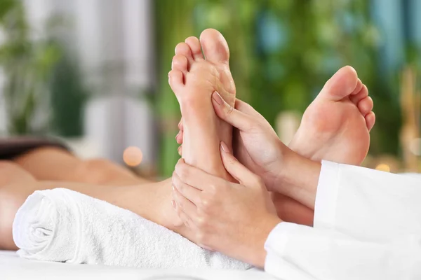 Woman relaxing with leg massage — Stock Photo, Image