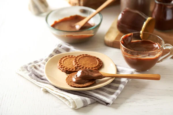 Melted chocolate on glass bowl — Stock Photo, Image