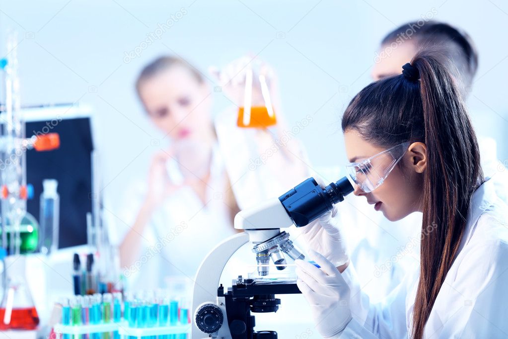 Medical technicians working in laboratory