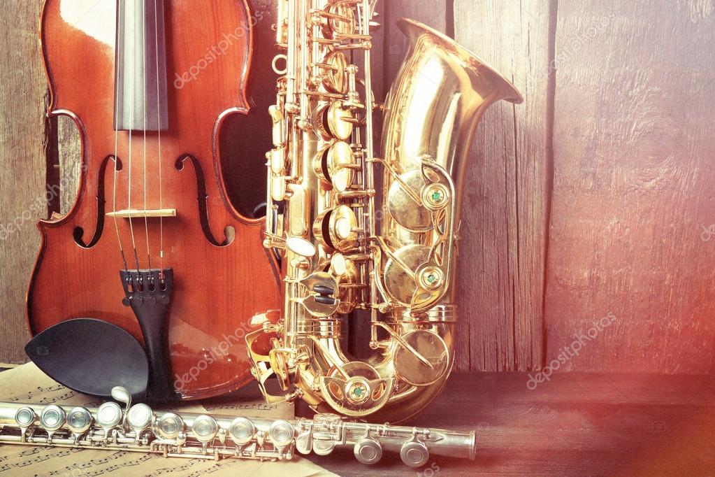 Musical instruments saxophone, violin and flute — Stock Photo
