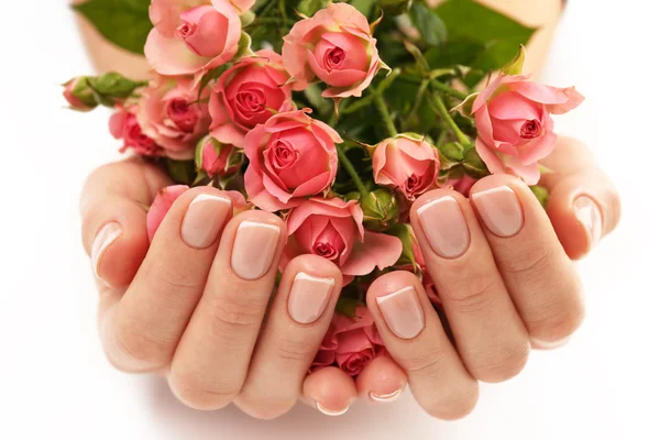 Woman hands with beautiful roses — Stock Photo, Image