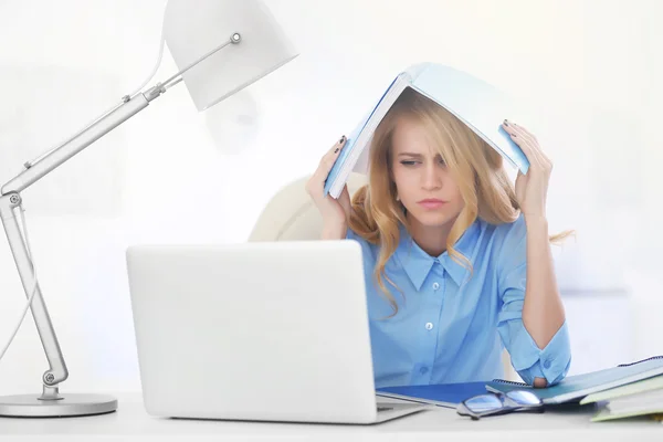 Tired woman at the laptop — Stock Photo, Image