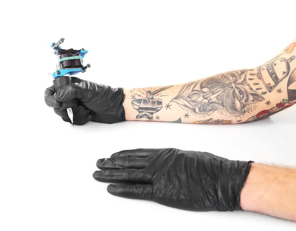 Tattooist hands in black gloves — Stock Photo, Image