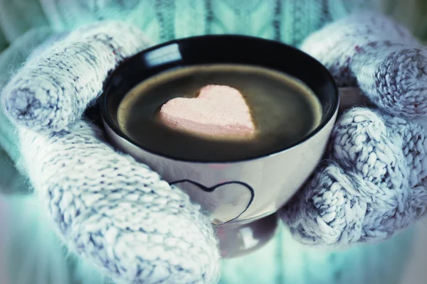 Hands in holding cup — Stock Photo, Image