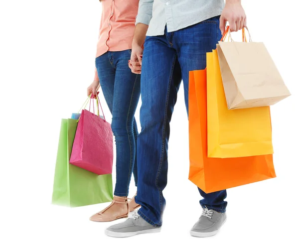 Pareja con coloridas bolsas de compras — Foto de Stock