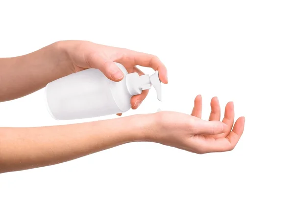 Mani che applicano la crema per le mani — Foto Stock