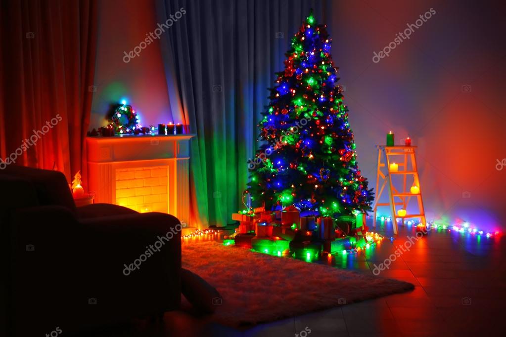 Christmas tree near fireplace — Stock Photo © belchonock #107397418