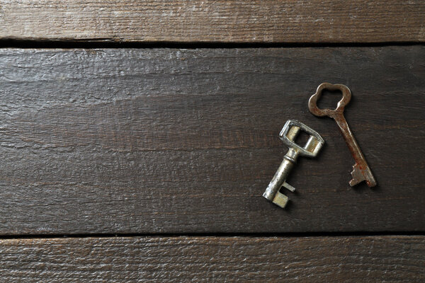 Old keys on wooden 