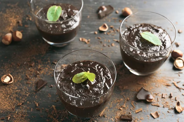 Glass cups of chocolate dessert — Stock Photo, Image