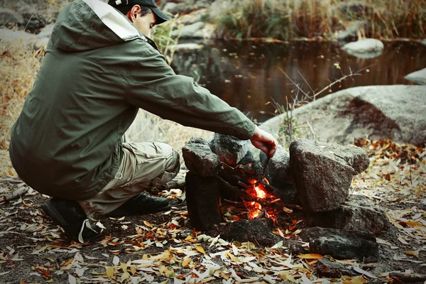 Man Making Fire Mountains — Stock Photo, Image