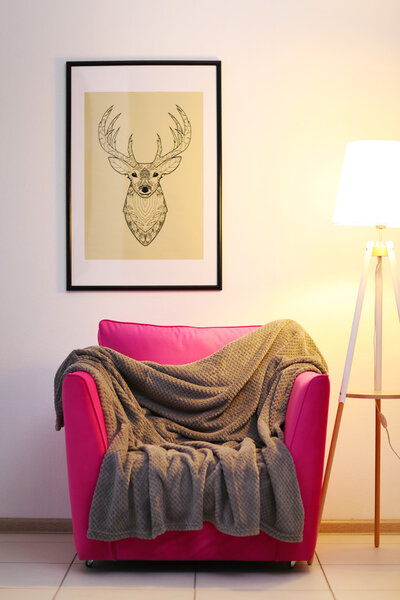 Pink armchair with blanket 