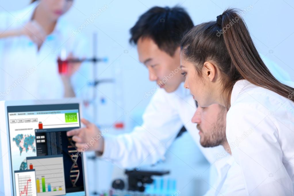 Medical technicians working in laboratory