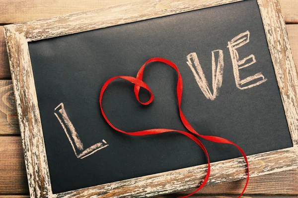 Love written on chalkboard, — Stock Photo, Image