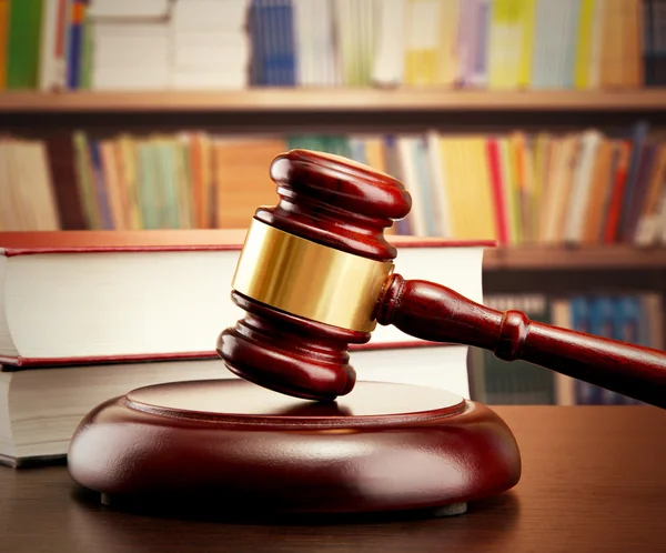 Judge gavel and books on table — Stock Photo, Image