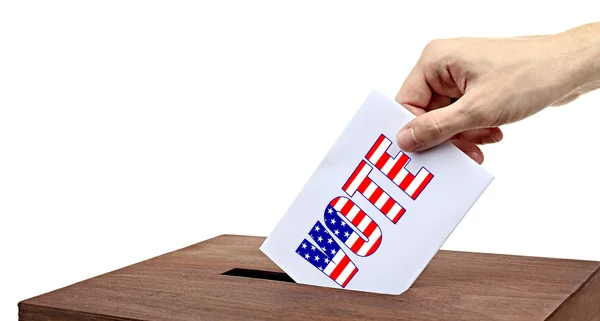 Hand inserting bulletin in ballot box — Stock Photo, Image