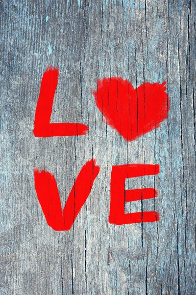 Word "Love" painted on wall — Stock Photo, Image