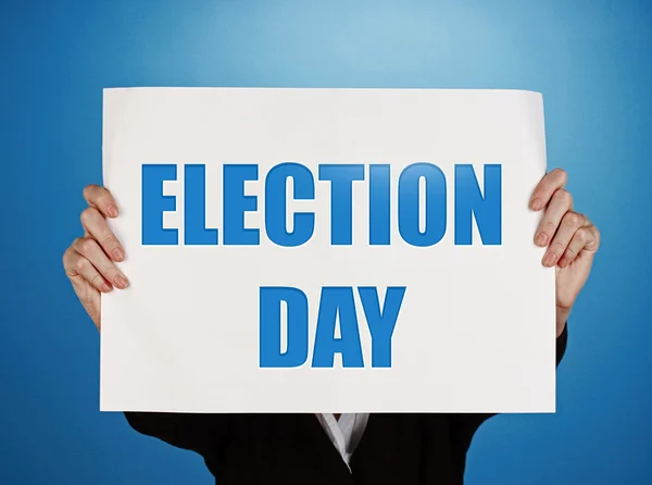 Card with Election Day text in hands — Stock Photo, Image