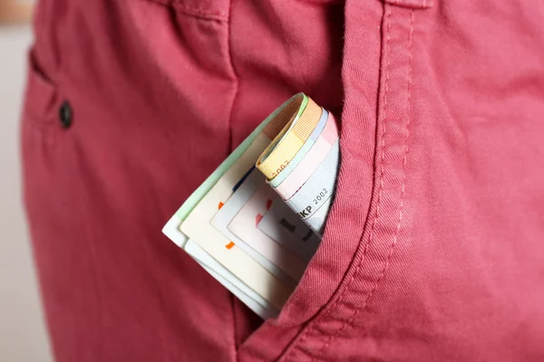 Money in the pink pocket — Stock Photo, Image