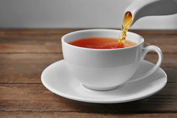 Masada bir fincan çay. — Stok fotoğraf