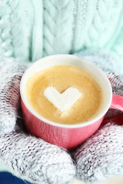 Hands  holding cup of hot cappuccino — Stock Photo, Image