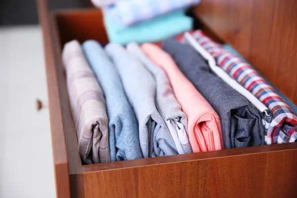 Neatly folded clothes — Stock Photo, Image