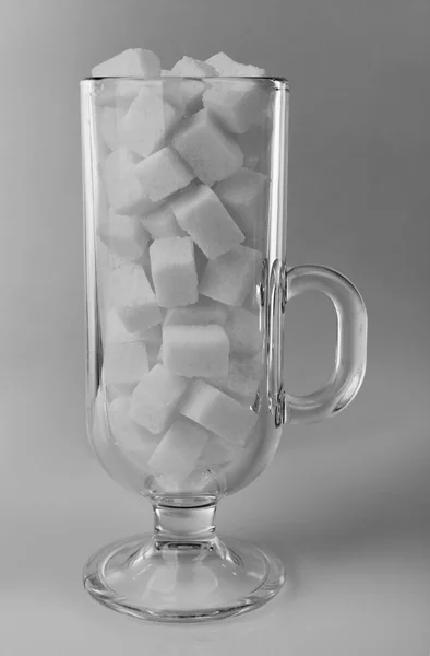 Glass filled with lump sugar — Stock Photo, Image