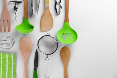 Set of stainless and wooden utensils  clipart