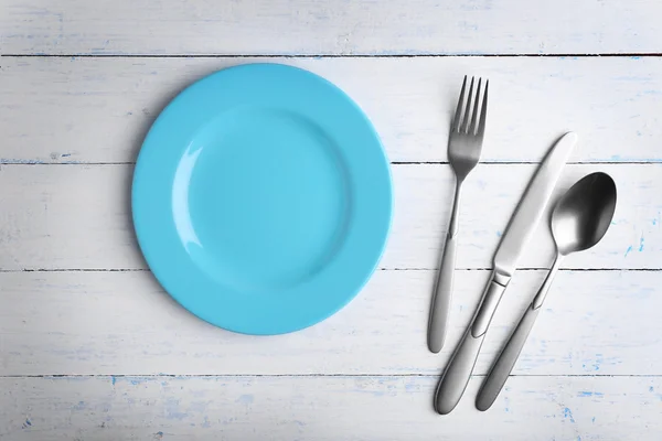 Empty plate with silver cutlery — Stock Photo, Image