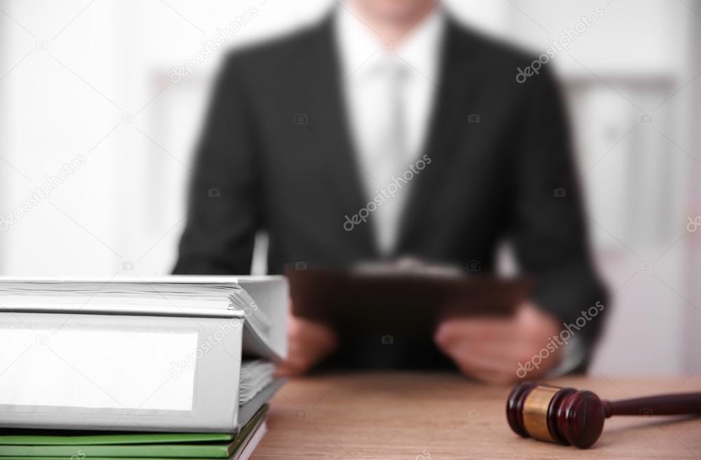 Young male judge working 
