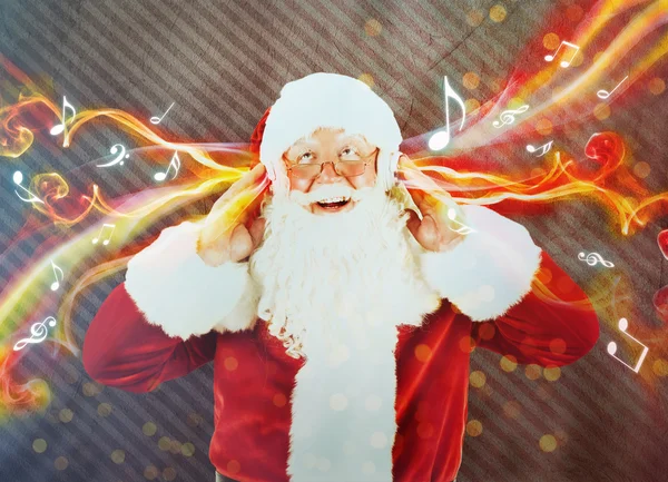 Weihnachtsmann mit Kopfhörer — Stockfoto