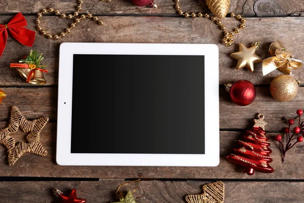 Tablet and Christmas decor — Stock Photo, Image