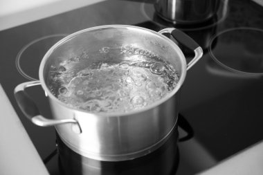 Boiling spaghetti in pan  clipart