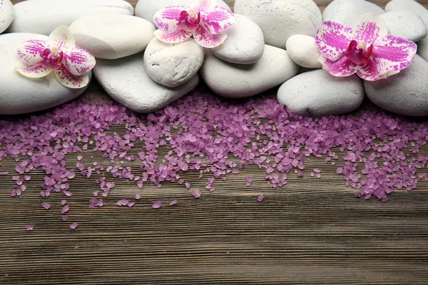 Spa stones and red orchid — Stock Photo, Image