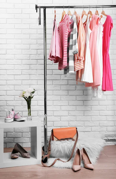 Collection of female clothes hanging — Stock Photo, Image