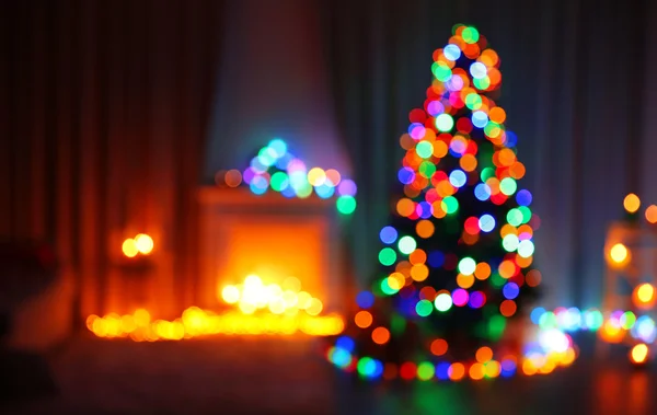 Christmas tree near fireplace — Stock Photo, Image