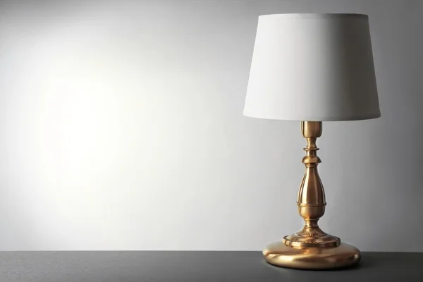 Table lamp on gray