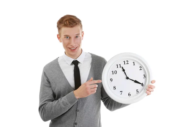 Handsome young man holding clock — Stock Photo, Image