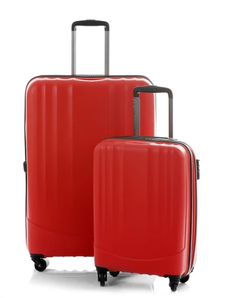 Different suitcases standing on floor — Stock Photo, Image