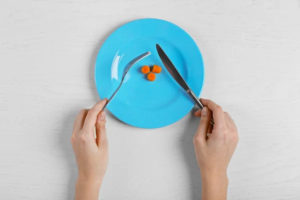 Hands holding fork and knife — Stock Photo, Image