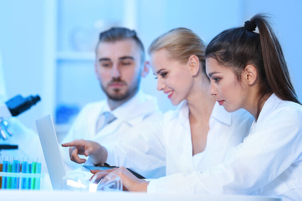 Medical technicians working in laboratory