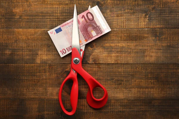 Scissors cuts euro banknote — Stock Photo, Image