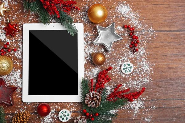 Tablet and Christmas decor — Stock Photo, Image