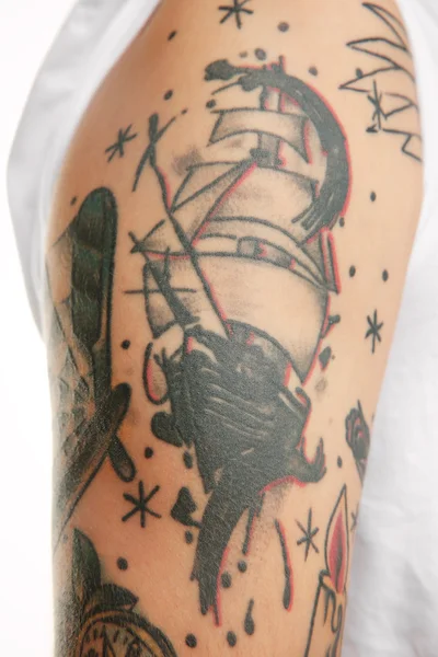 Ship tattoo on male arm — Stock Photo, Image