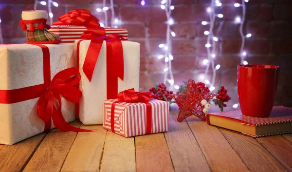 Christmas gift boxes and lights — Stock Photo, Image