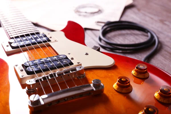 Electric guitar with springs and notes — Stock Photo, Image