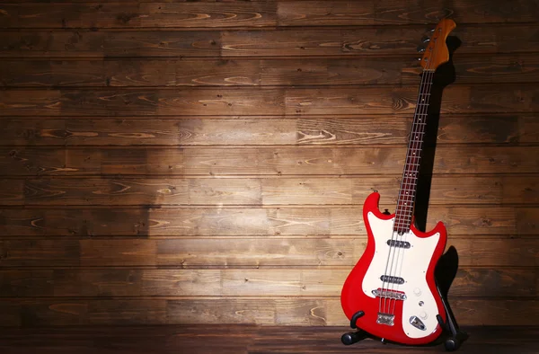 Electric guitar on wooden background — Stock Photo, Image